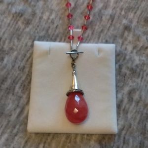 Coral colored lariat style beaded necklace